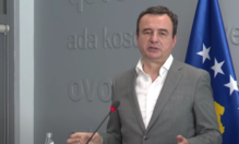 Шиптар у сакоу